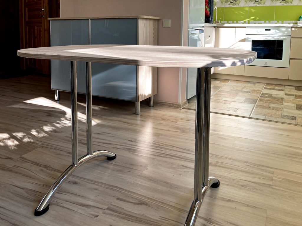 Antaris made oval kitchen table with nickel-plated legs